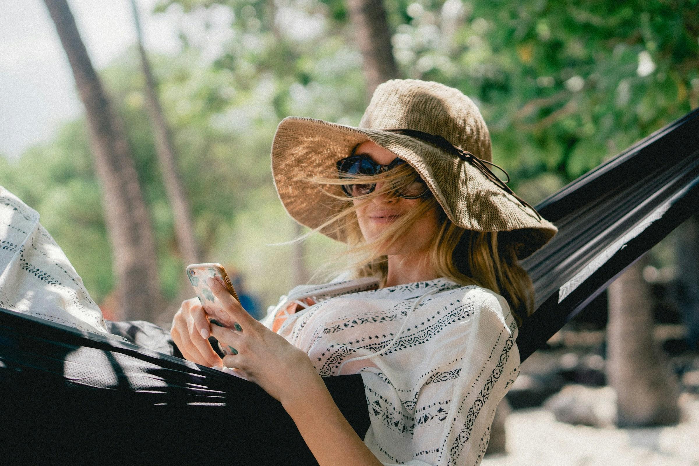 Woman relaxing on hammock